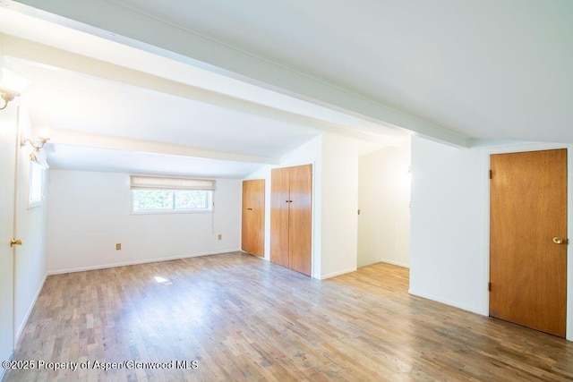 1105 Bennett Ave, Glenwood Springs, CO 81601 - unfurnished room with wood finished floors and vaulted ceiling