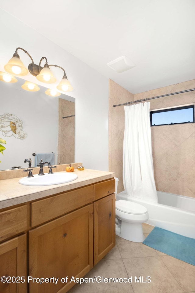 full bathroom featuring toilet, tile patterned flooring, shower / bath combo, and vanity