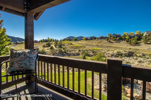 balcony with a rural view and a mountain view