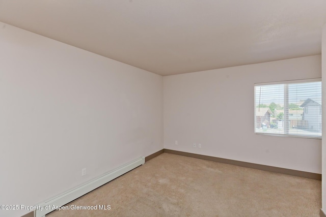 109 Anna Ct Unit B8, Grand Junction, CO 81503 - empty room with baseboard heating and light carpet