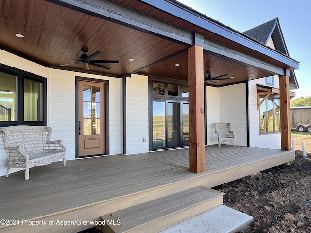 wooden deck with ceiling fan