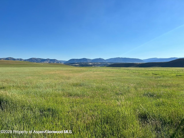 view of mountain feature featuring a rural view