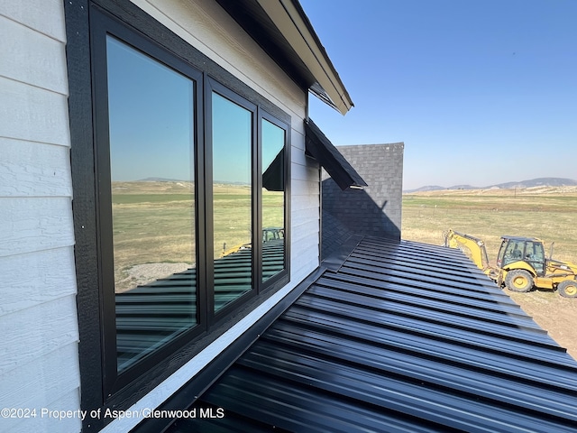 exterior space featuring a mountain view and a rural view