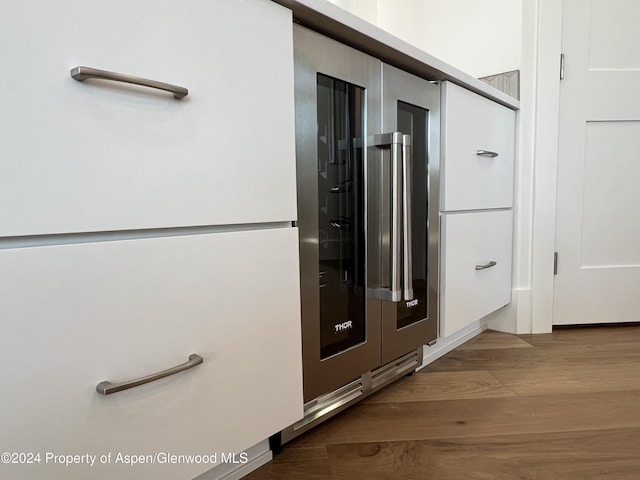 corridor featuring wood-type flooring