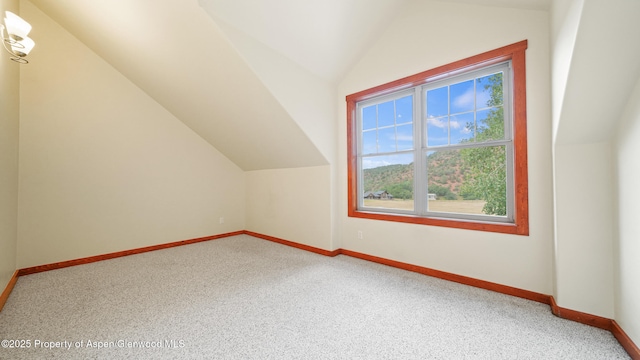 148 Laird Ln, Glenwood Springs, CO 81601 - bonus room featuring vaulted ceiling and carpet flooring