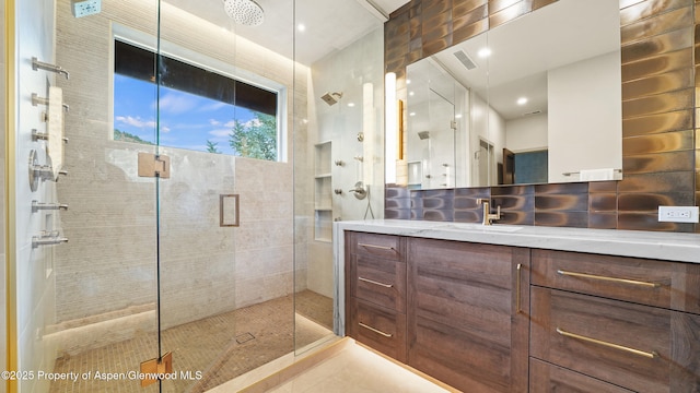148 Laird Ln, Glenwood Springs, CO 81601 - full bath featuring vanity, a stall shower, and tile patterned flooring