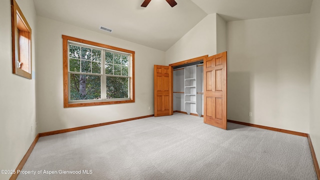 148 Laird Ln, Glenwood Springs, CO 81601 - unfurnished bedroom with light carpet, a ceiling fan, a closet, and high vaulted ceiling