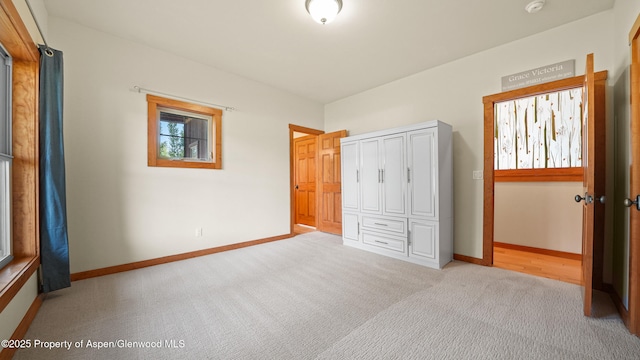 148 Laird Ln, Glenwood Springs, CO 81601 - unfurnished bedroom with light carpet and baseboards