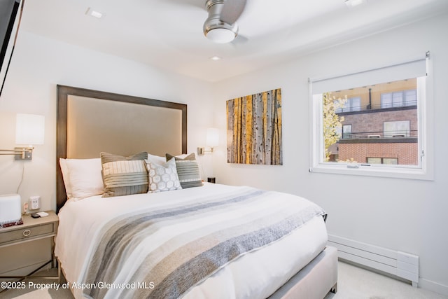 210 E Cooper Ave Unit 3G, Aspen, CO 81611 - bedroom featuring a baseboard heating unit, ceiling fan, and baseboards