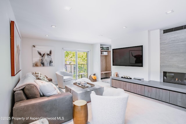 210 E Cooper Ave Unit 3G, Aspen, CO 81611 - living room with a glass covered fireplace and recessed lighting