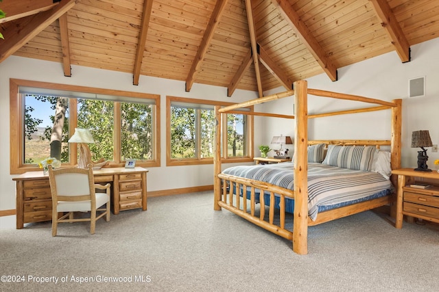 carpeted bedroom featuring vaulted ceiling with beams and wood ceiling