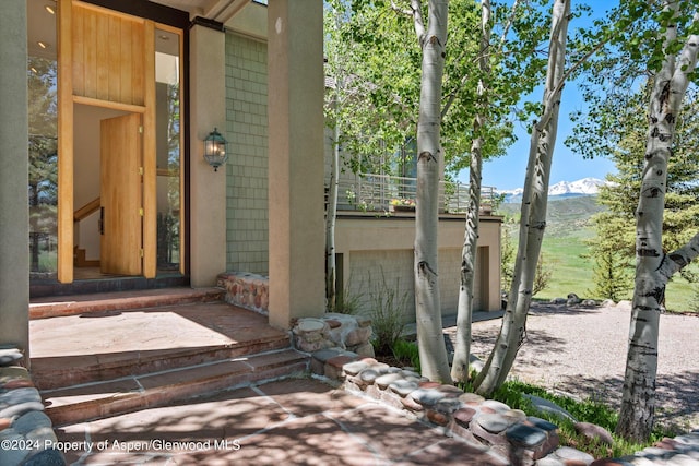 entrance to property featuring a mountain view