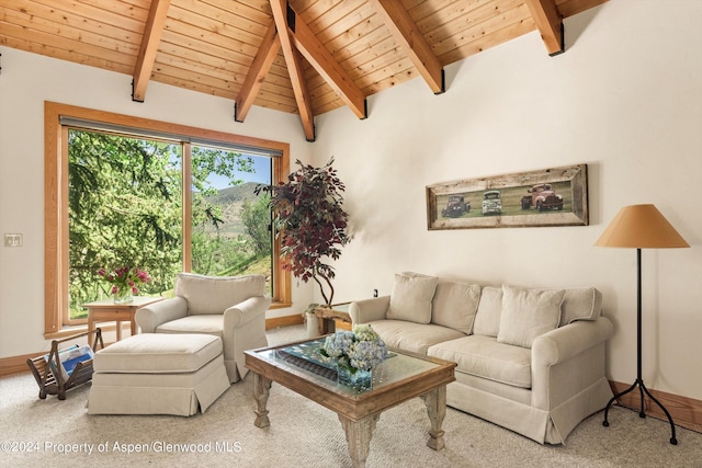 carpeted living room featuring lofted ceiling with beams and wood ceiling