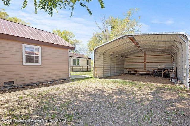 648 Colorado St, Craig, CO 81625 - view of parking featuring a detached carport