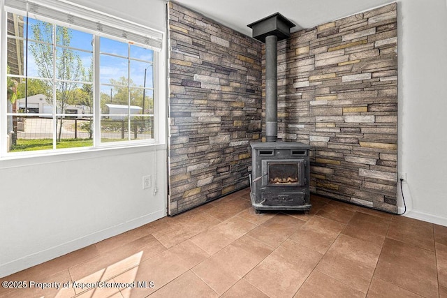 648 Colorado St, Craig, CO 81625 - detailed view of baseboards and a wood stove