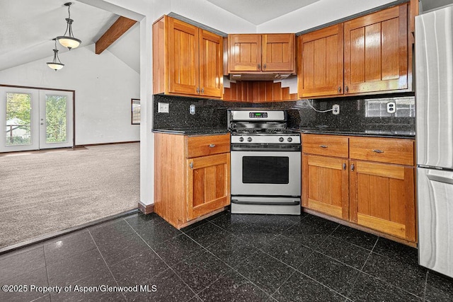 648 Colorado St, Craig, CO 81625 - kitchen with stainless steel appliances, granite floors, baseboards, under cabinet range hood, and tasteful backsplash