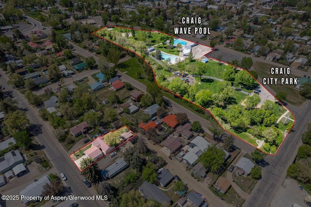 648 Colorado St, Craig, CO 81625 - aerial overview of property's location featuring a pool and property boundaries highlighted