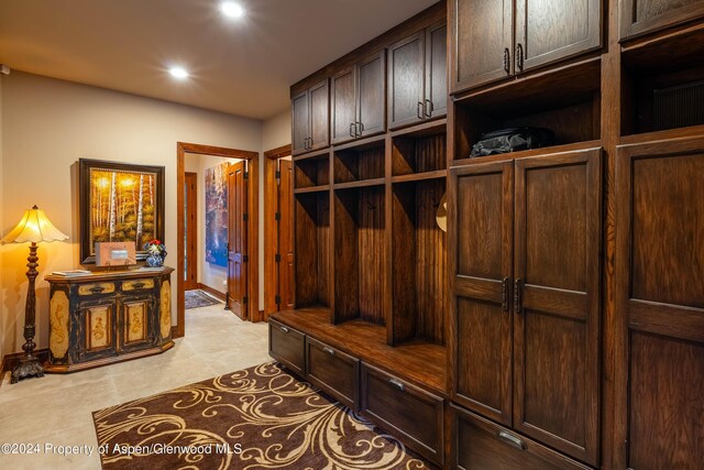 mudroom featuring light tile patterned flooring