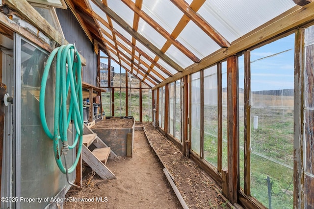 unfurnished sunroom featuring a healthy amount of sunlight