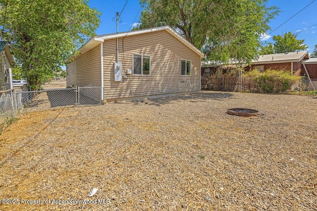 627 Lake St, Rangely, CO 81648 - rear view of property featuring a fenced backyard