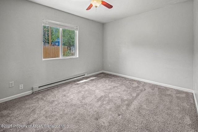 627 Lake St, Rangely, CO 81648 - unfurnished room with a baseboard radiator, a ceiling fan, and carpet floors