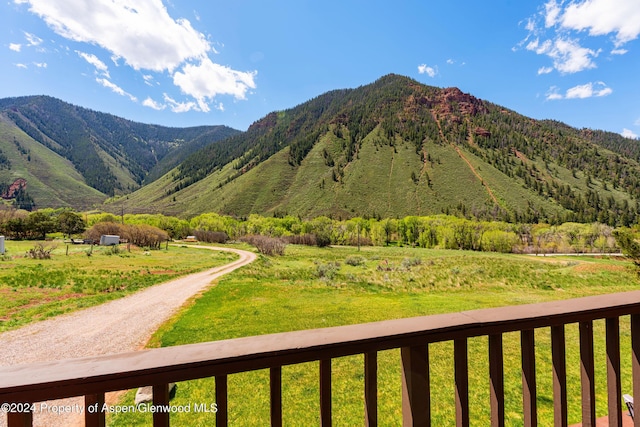 view of mountain feature with a rural view