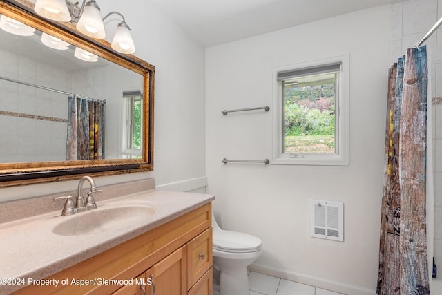 bathroom with tile patterned flooring, vanity, toilet, and a shower with shower curtain