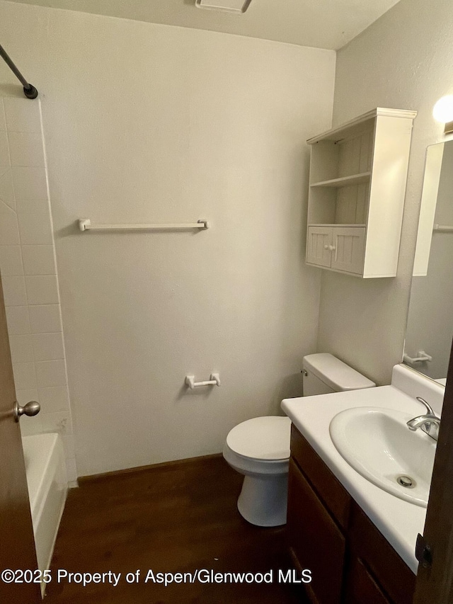 6616 High Dr, Morrison, CO 80465 - full bath featuring vanity, wood finished floors, and shower / bath combination