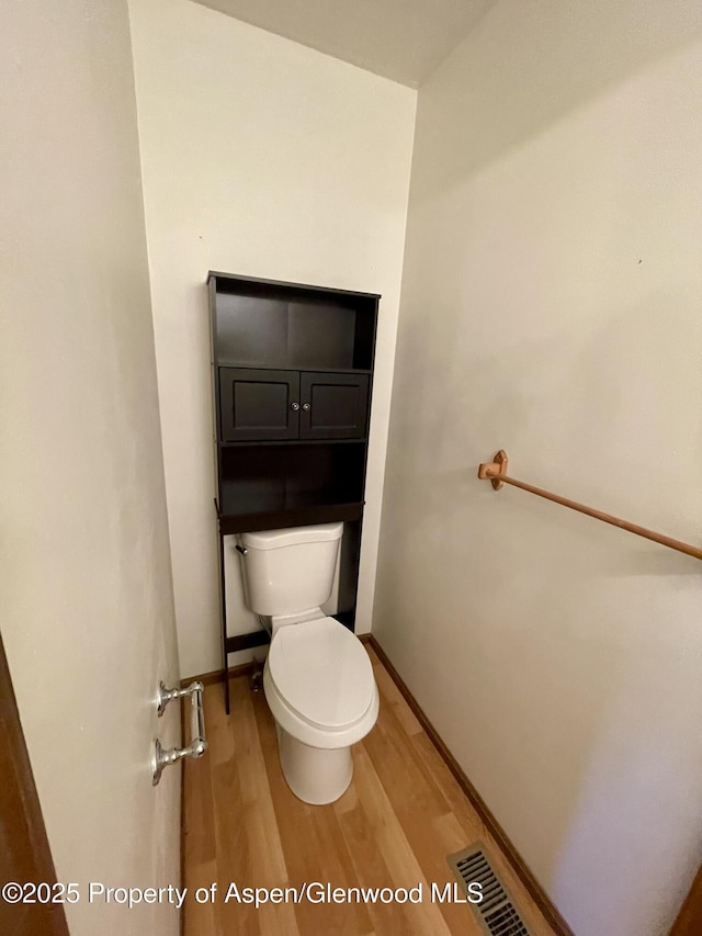 6616 High Dr, Morrison, CO 80465 - bathroom featuring toilet and wood finished floors