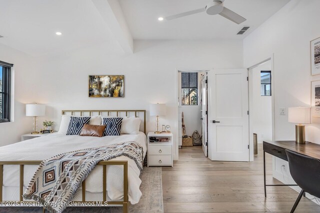 bedroom with light wood-type flooring and ceiling fan