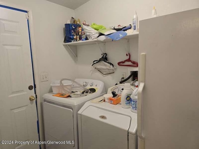 washroom featuring separate washer and dryer