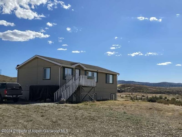 manufactured / mobile home featuring a mountain view