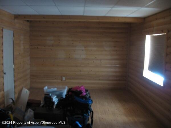 spare room featuring hardwood / wood-style flooring