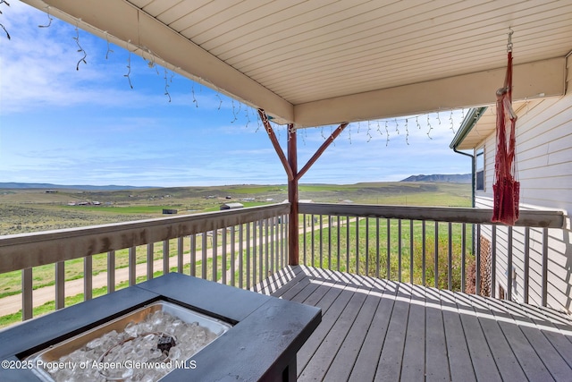 1210 County Road 103, Craig, CO 81625 - wooden terrace with a mountain view