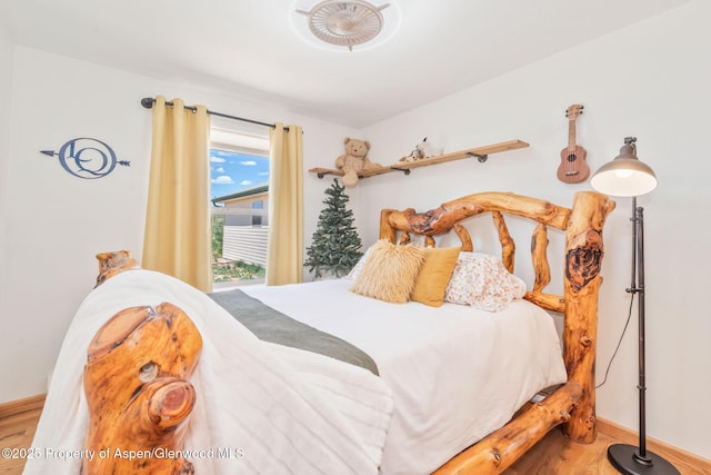 1210 County Road 103, Craig, CO 81625 - bedroom featuring wood finished floors and baseboards
