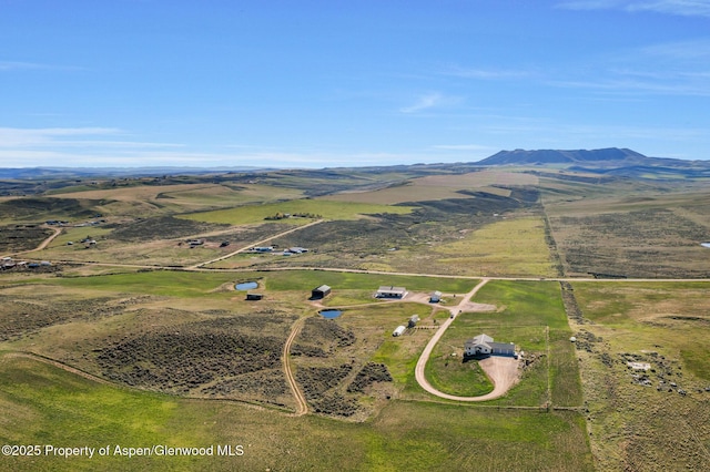 1210 County Road 103, Craig, CO 81625 - aerial view of sparsely populated area featuring a mountainous background