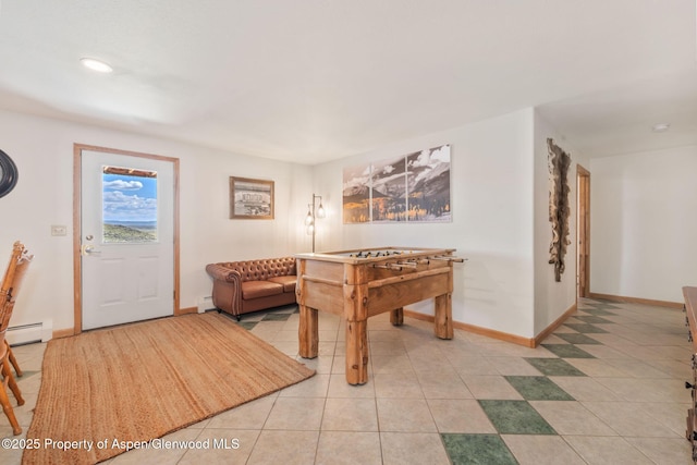 1210 County Road 103, Craig, CO 81625 - playroom with a baseboard radiator, baseboards, light tile patterned flooring, and recessed lighting