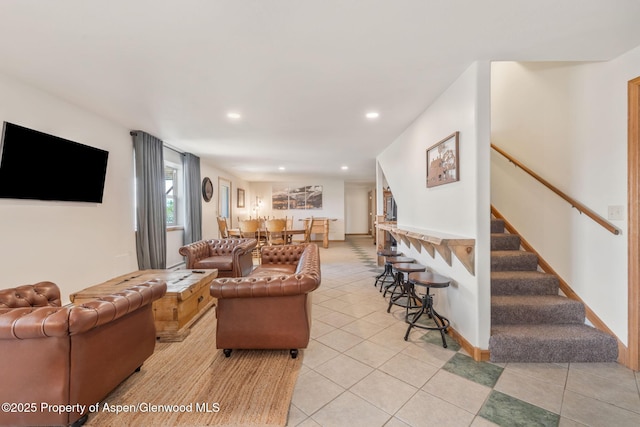 1210 County Road 103, Craig, CO 81625 - living area featuring recessed lighting, light tile patterned flooring, and stairway