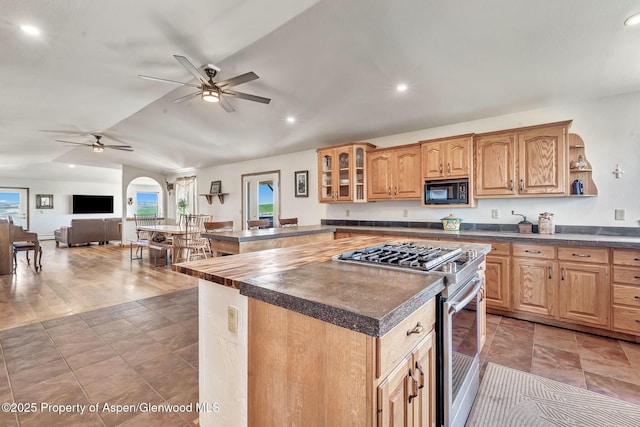 1210 County Road 103, Craig, CO 81625 - kitchen with stainless steel gas range, black microwave, dark countertops, ceiling fan, and recessed lighting