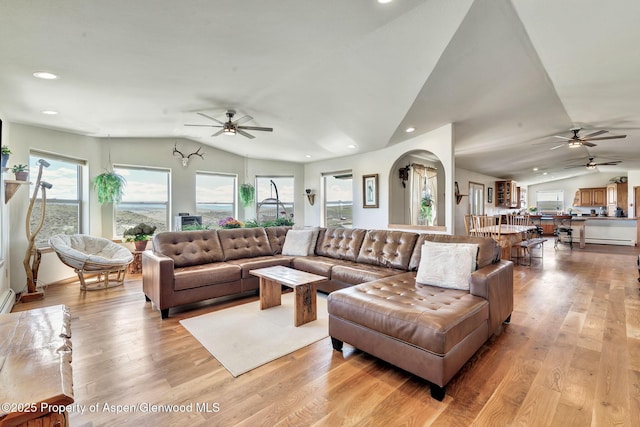 1210 County Road 103, Craig, CO 81625 - living room with ceiling fan, vaulted ceiling, light wood-style floors, recessed lighting, and arched walkways