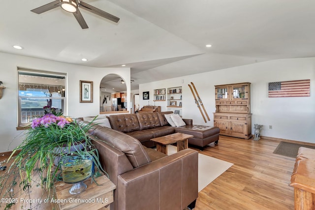 1210 County Road 103, Craig, CO 81625 - living room with a ceiling fan, arched walkways, light wood-style flooring, recessed lighting, and baseboards