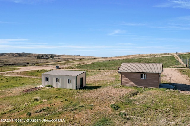 1210 County Road 103, Craig, CO 81625 - view of outdoor structure featuring an outbuilding and a rural view