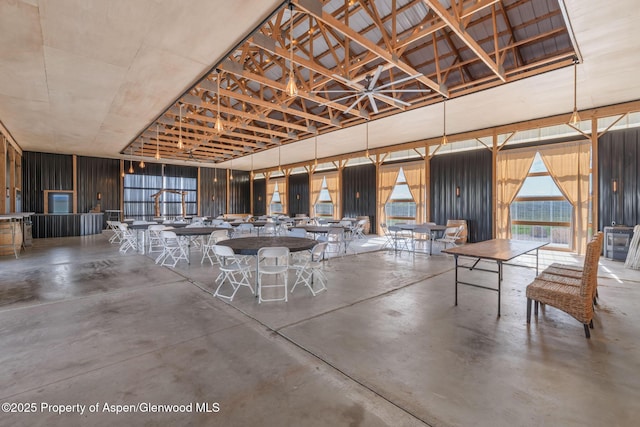 1210 County Road 103, Craig, CO 81625 - dining area with finished concrete flooring and a towering ceiling