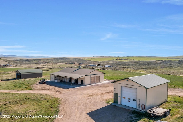1210 County Road 103, Craig, CO 81625 - overview of rural landscape featuring mountains