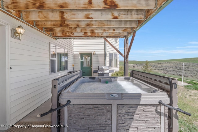 1210 County Road 103, Craig, CO 81625 - wooden terrace featuring a hot tub