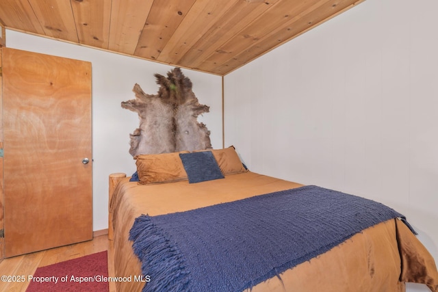 1210 County Road 103, Craig, CO 81625 - bedroom with wood finished floors and wood ceiling