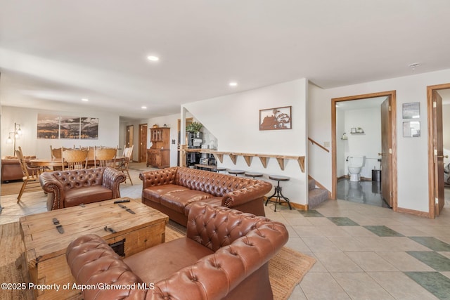 1210 County Road 103, Craig, CO 81625 - living room featuring stairway, recessed lighting, light tile patterned floors, and baseboards