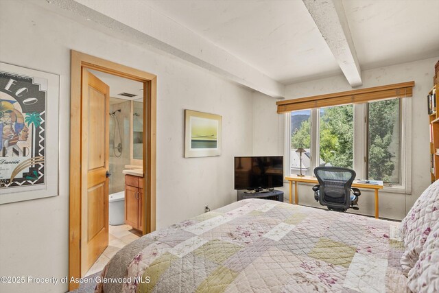 124 W Hyman Ave Unit 3B, Aspen, CO 81611 - bedroom featuring beam ceiling, light tile patterned floors, and connected bathroom