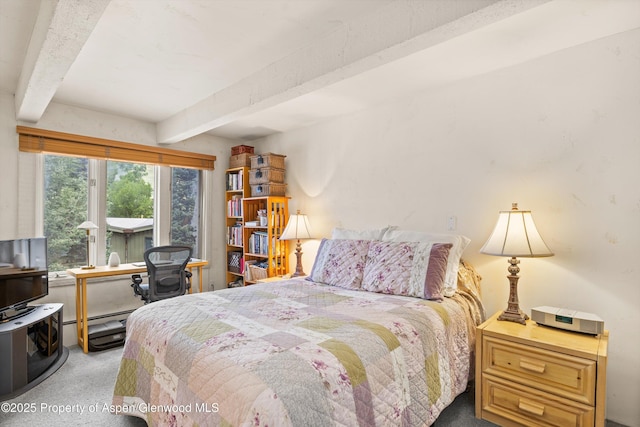 124 W Hyman Ave Unit 3B, Aspen, CO 81611 - bedroom with beamed ceiling and carpet floors