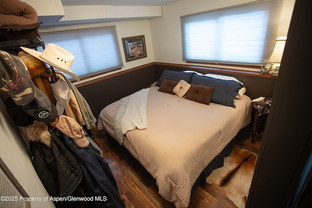 212 Safflower Ct, New Castle, CO 81647 - bedroom with wood finished floors